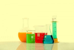 chemistry bottles with liquid inside